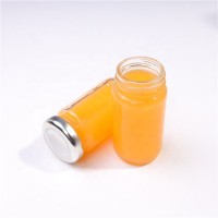 Wholesale 2oz Empty Clear Glass Round Concentrate Juice Package Bottle 60ml Glass Bottles With Metal Lids